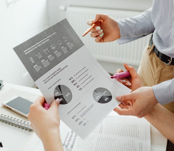 A person holding a piece of paper